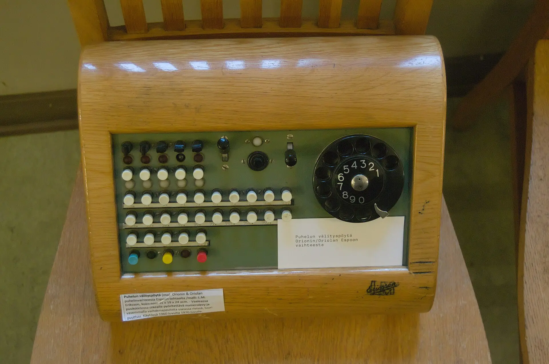An old telephone exchange switchboard with its cords and jacks